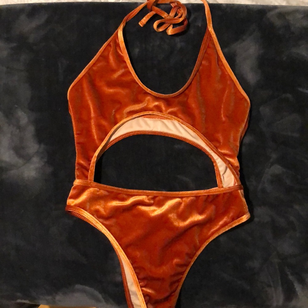 Burnt orange one piece ☄️
